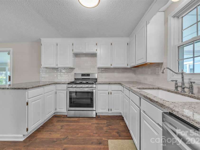 1975 Old Wilkesboro Road, Taylorsville, NC 28681.  MLS# CAR4243229, YatesRealty ID 7948. Kitchen