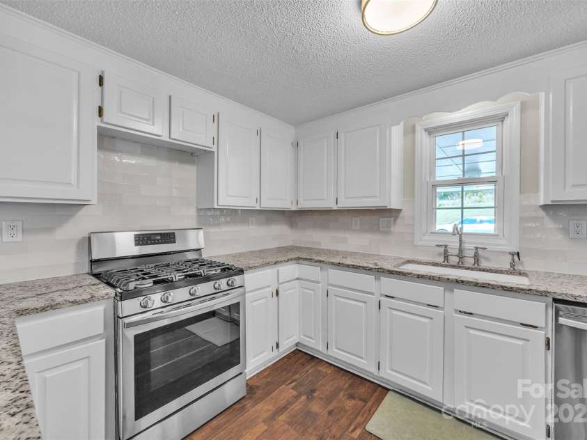 1975 Old Wilkesboro Road, Taylorsville, NC 28681.  MLS# CAR4243229, YatesRealty ID 7948. Kitchen