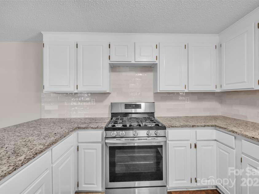 1975 Old Wilkesboro Road, Taylorsville, NC 28681.  MLS# CAR4243229, YatesRealty ID 7948. Kitchen