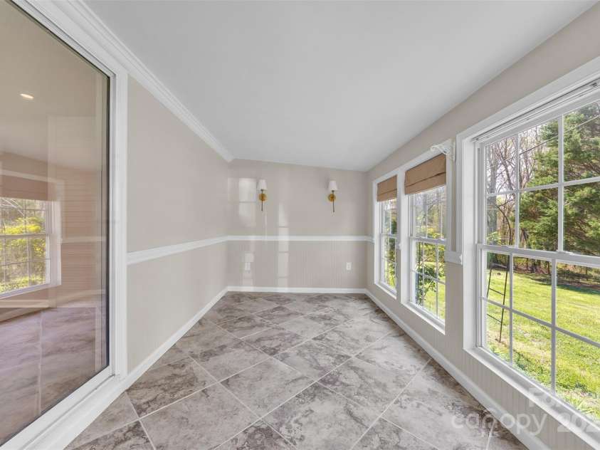 1975 Old Wilkesboro Road, Taylorsville, NC 28681.  MLS# CAR4243229, YatesRealty ID 7948. Sunroom