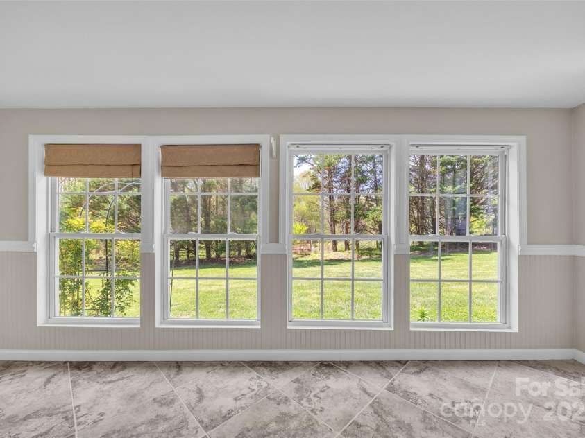 1975 Old Wilkesboro Road, Taylorsville, NC 28681.  MLS# CAR4243229, YatesRealty ID 7948. Sunroom