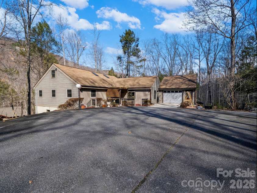 111 Buckeye Road, Lake Lure, NC 28746.  MLS# CAR4330936, YatesRealty ID 7952. 