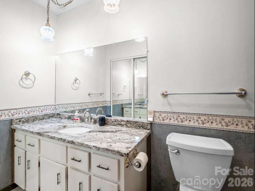 111 Buckeye Road, Lake Lure, NC 28746.  MLS# CAR4330936, YatesRealty ID 7952. Primary bathroom.