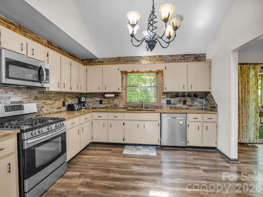 111 Buckeye Road, Lake Lure, NC 28746.  MLS# CAR4420139, YatesRealty ID 7952. 