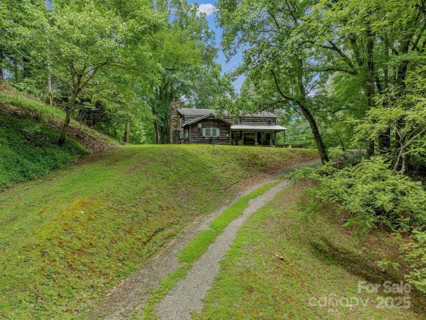 2395 Hortons Creek Road, Burnsville, NC 28714.  MLS# CAR4219244, YatesRealty ID 7959. 