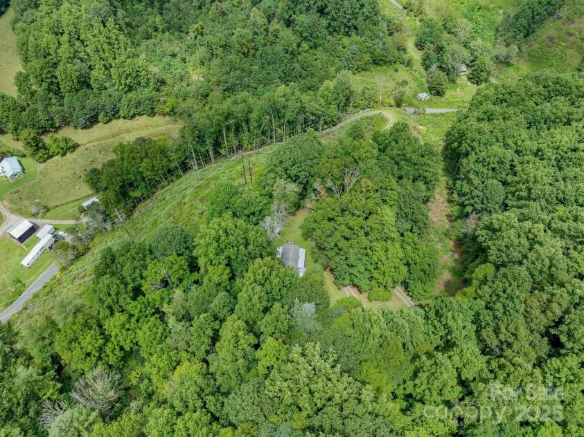 2395 Hortons Creek Road, Burnsville, NC 28714.  MLS# CAR4219244, YatesRealty ID 7959. 