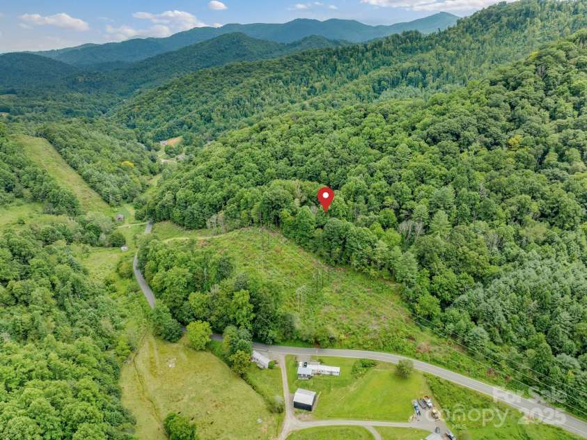 2395 Hortons Creek Road, Burnsville, NC 28714.  MLS# CAR4219244, YatesRealty ID 7959. 