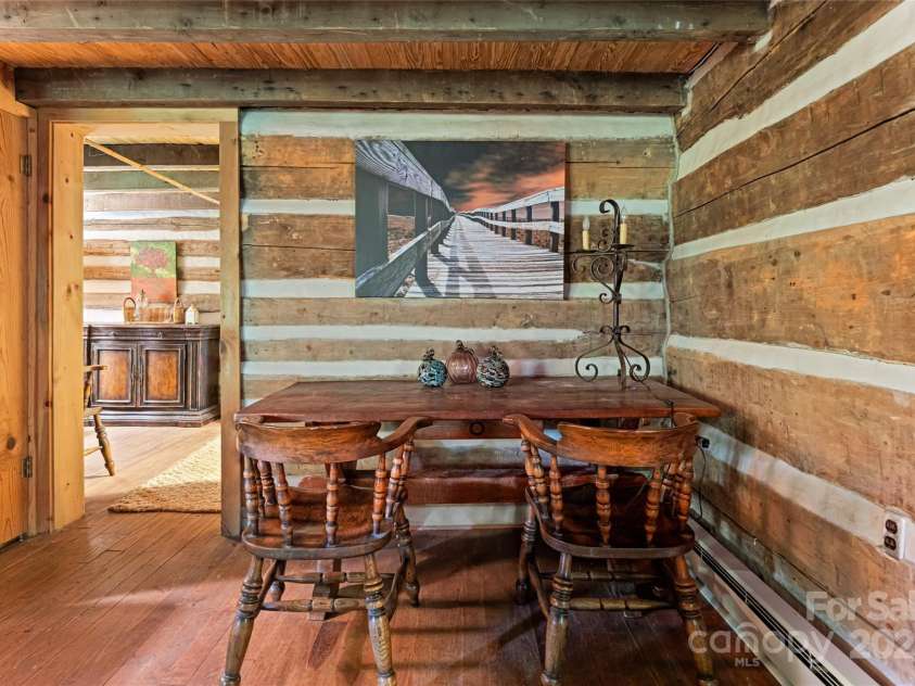 2395 Hortons Creek Road, Burnsville, NC 28714.  MLS# CAR4219244, YatesRealty ID 7959. Dining nook? Game Table? Both!