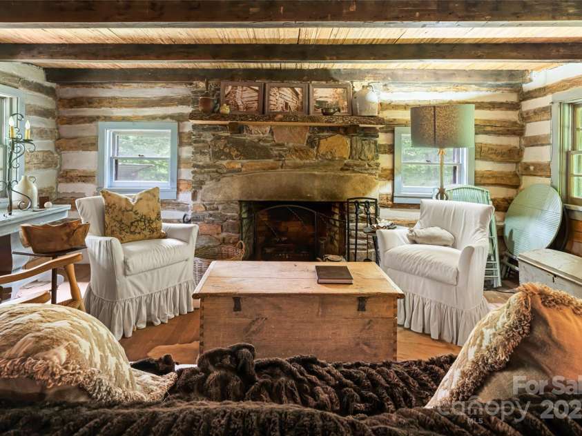 2395 Hortons Creek Road, Burnsville, NC 28714.  MLS# CAR4219244, YatesRealty ID 7959. Imagine a roaring file and a cup of coffee or hot chocolate.