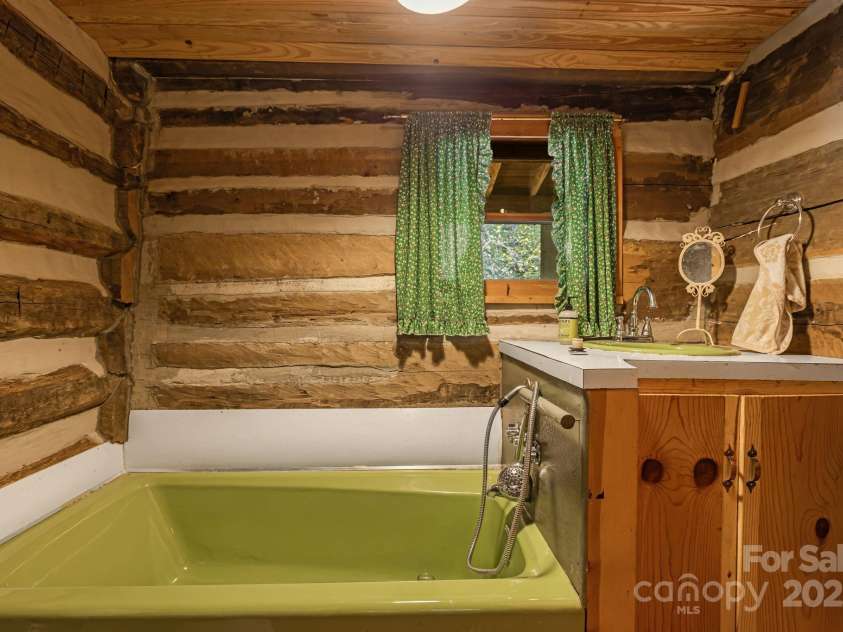 2395 Hortons Creek Road, Burnsville, NC 28714.  MLS# CAR4313609, YatesRealty ID 7959. Bathroom no. 1