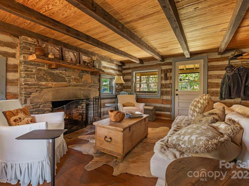 2395 Hortons Creek Road, Burnsville, NC 28714.  MLS# CAR4313609, YatesRealty ID 7959. Family room