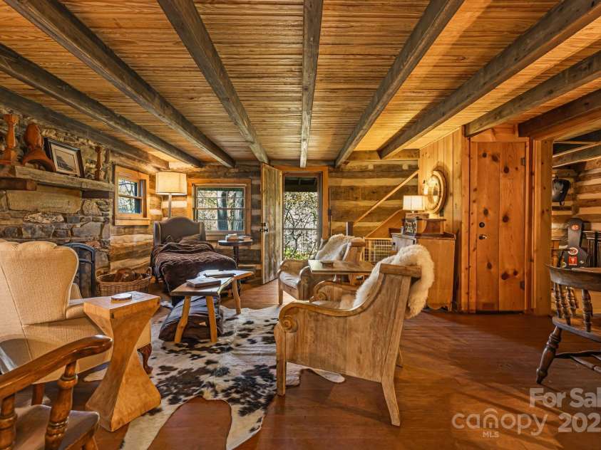 2395 Hortons Creek Road, Burnsville, NC 28714.  MLS# CAR4313609, YatesRealty ID 7959. Living room