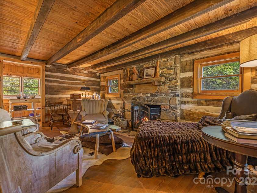 2395 Hortons Creek Road, Burnsville, NC 28714.  MLS# CAR4313609, YatesRealty ID 7959. Looking toward kitchen