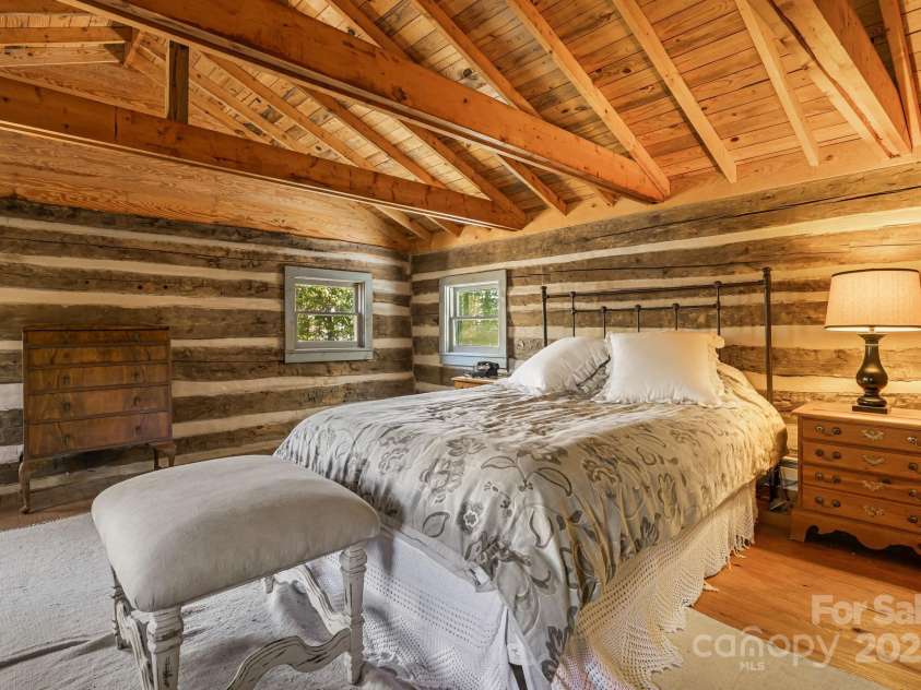 2395 Hortons Creek Road, Burnsville, NC 28714.  MLS# CAR4313609, YatesRealty ID 7959. Primary bedroom