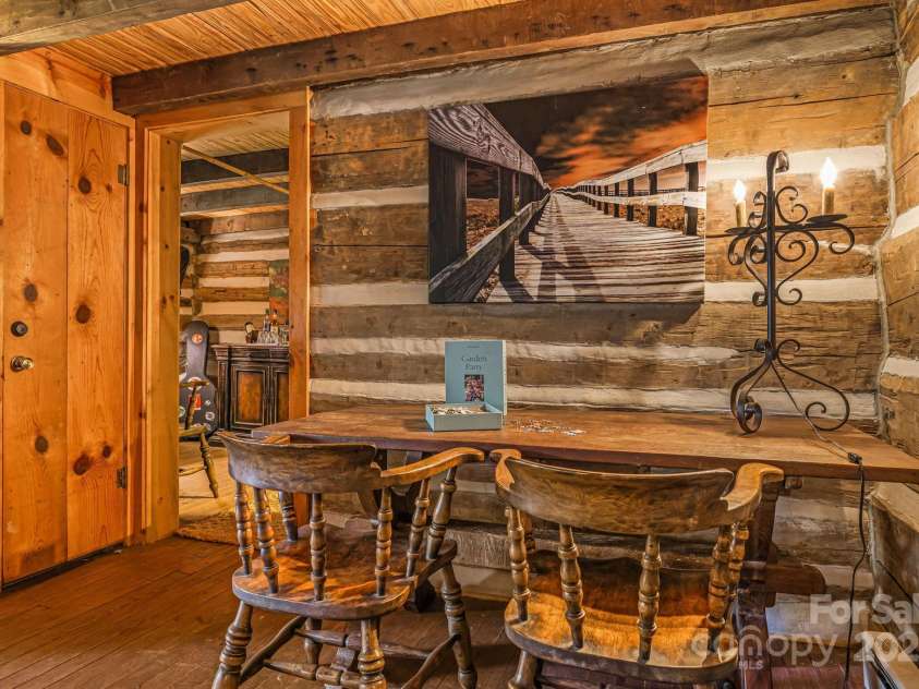 2395 Hortons Creek Road, Burnsville, NC 28714.  MLS# CAR4313609, YatesRealty ID 7959. Side area