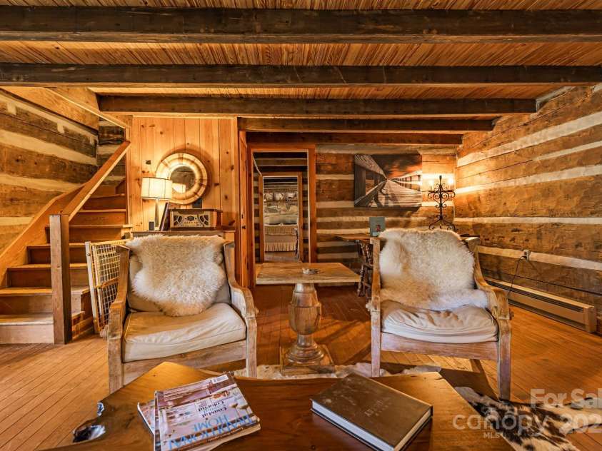 2395 Hortons Creek Road, Burnsville, NC 28714.  MLS# CAR4313609, YatesRealty ID 7959. Stairs to second floor