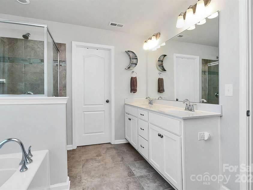 1419 Ava Lane, Denver, NC 28037.  MLS# CAR4133765, YatesRealty ID 7964. Double vanity, stand-up shower and tub