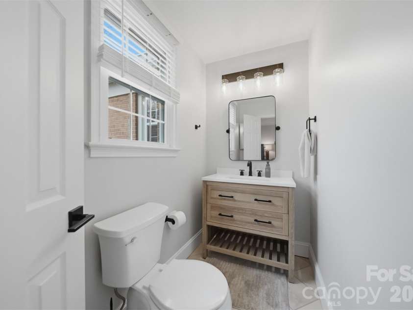 1002 Brady Avenue, Newton, NC 28658.  MLS# CAR4337906, YatesRealty ID 7965. Half Bath Ensuite (Main)