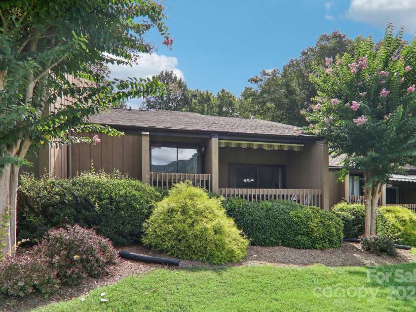 182 Lake Drive, Lake Lure, NC 28746.  MLS# CAR4170164, YatesRealty ID 7965. Back of Condo