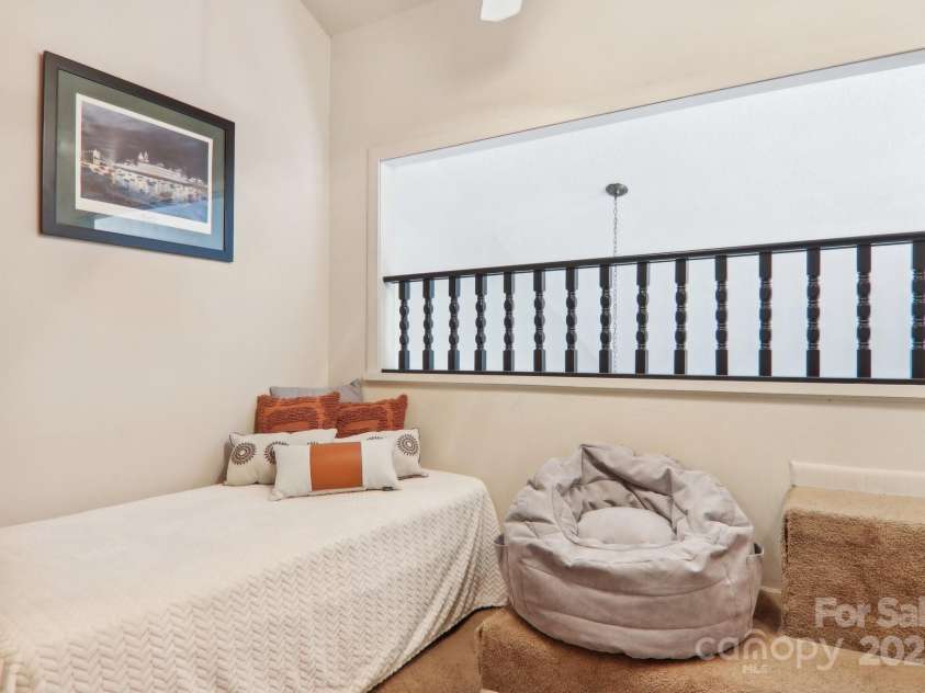 182 Lake Drive, Lake Lure, NC 28746.  MLS# CAR4170164, YatesRealty ID 7965. Bonus loft area overlooking living room