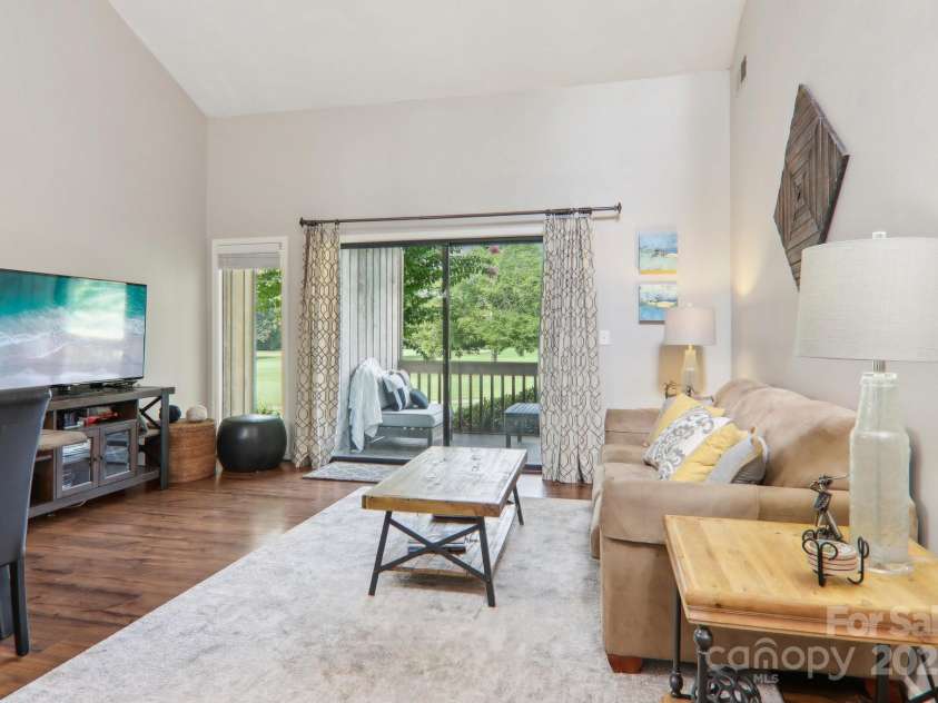 182 Lake Drive, Lake Lure, NC 28746.  MLS# CAR4170164, YatesRealty ID 7965. Large flat screen TV