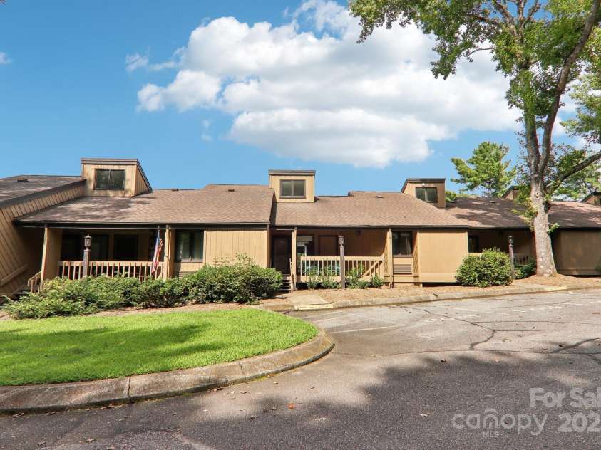 182 Lake Drive, Lake Lure, NC 28746.  MLS# CAR4170164, YatesRealty ID 7965. Plenty of assigned parking right in front