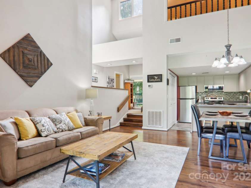 182 Lake Drive, Lake Lure, NC 28746.  MLS# CAR4170164, YatesRealty ID 7965. Vaulted main living area feels bright and spacious