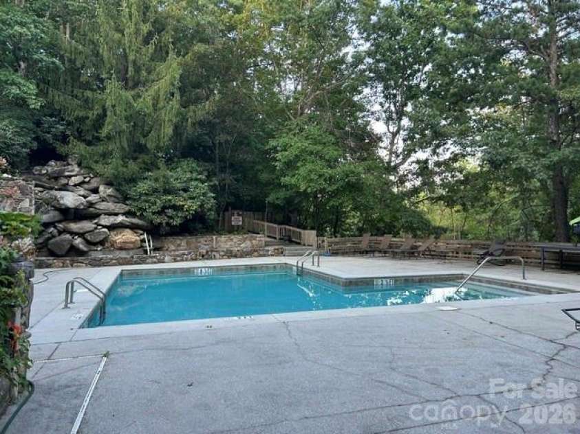157 Toxaway Views Drive, Lake Toxaway, NC 28747.  MLS# CAR4417213, YatesRealty ID 7969. Community pool