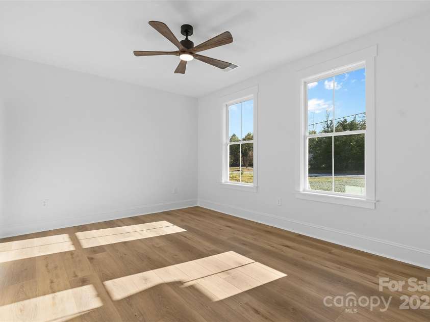 4734 Polk Ford Road, Stanfield, NC 28163.  MLS# CAR4321692, YatesRealty ID 7971. *representative photo- bedroom one w/ ensuite full bath