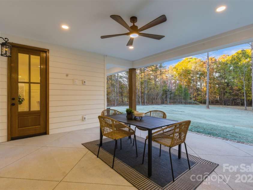 4734 Polk Ford Road, Stanfield, NC 28163.  MLS# CAR4321692, YatesRealty ID 7971. *representative photo- covered back porch w/ cedar pillars, ceiling fan