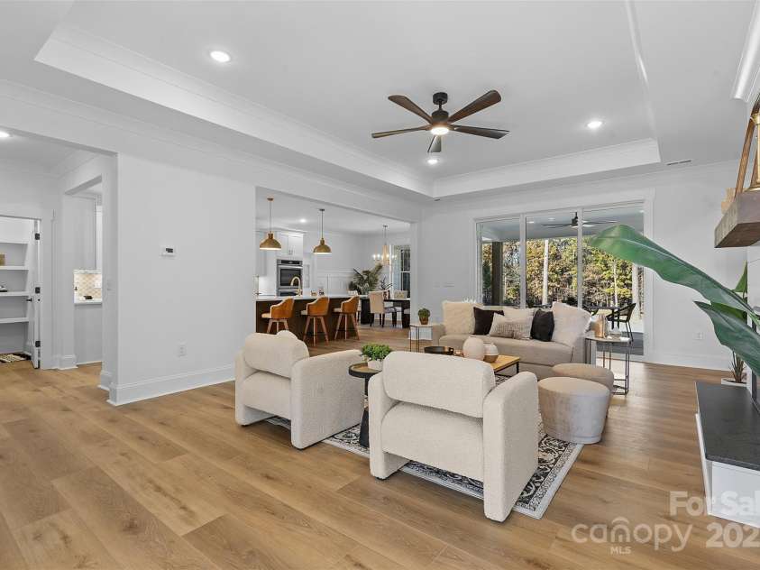 4734 Polk Ford Road, Stanfield, NC 28163.  MLS# CAR4321692, YatesRealty ID 7971. *representative photo- family room w/ tray ceiling, shiplap fireplace & cedar mantle!
