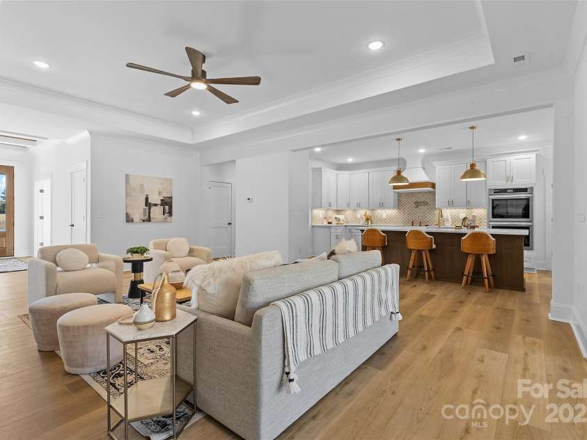 4734 Polk Ford Road, Stanfield, NC 28163.  MLS# CAR4321692, YatesRealty ID 7971. *representative photo- family room w/ tray ceiling, shiplap fireplace & cedar mantle!