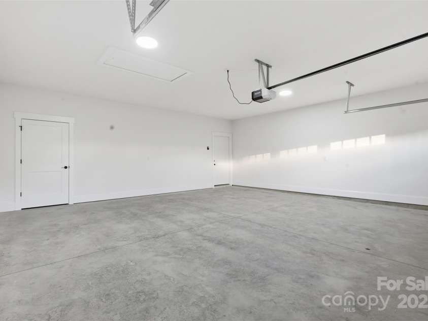 4734 Polk Ford Road, Stanfield, NC 28163.  MLS# CAR4321692, YatesRealty ID 7971. *representative photo- oversized 2 car garage- great for storage!