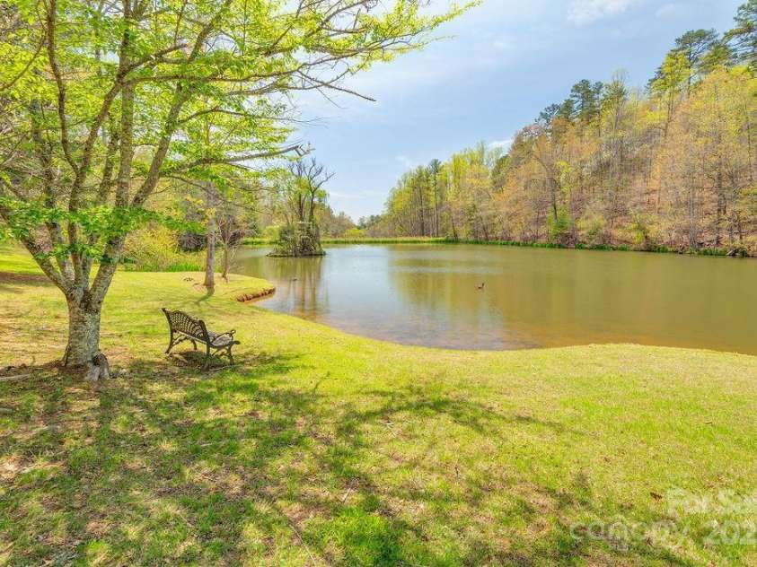 279 Red Oak Lane, Marshall, NC 28753.  MLS# CAR4247763, YatesRealty ID 7975. Community Pond