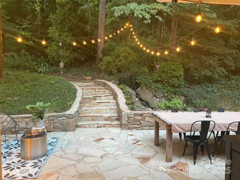 78 Sleepy Hollow Drive, Asheville, NC 28805.  MLS# CAR4155271, YatesRealty ID 7988. Back Yard Entertaining Area
