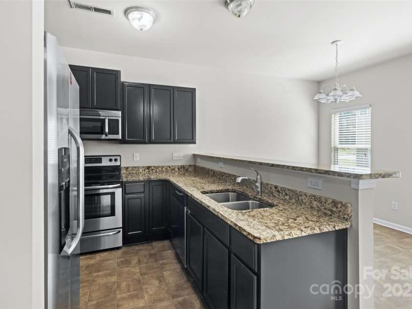 14328 Evening Flight Lane, Charlotte, NC 28262.  MLS# CAR4240990, YatesRealty ID 7989. 