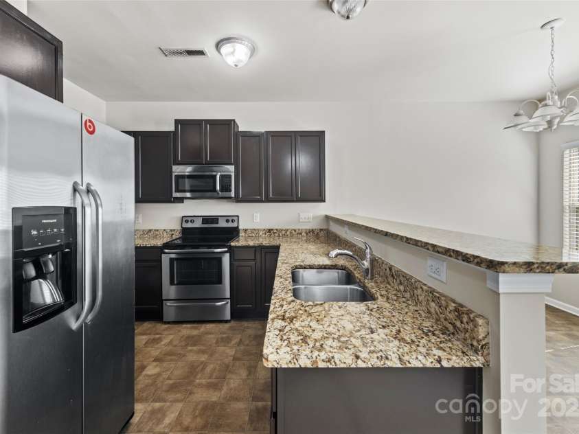 14328 Evening Flight Lane, Charlotte, NC 28262.  MLS# CAR4240990, YatesRealty ID 7989. 