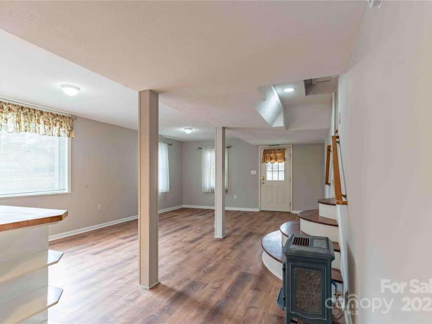 311 Buncombe Street, Hendersonville, NC 28739.  MLS# CAR4176141, YatesRealty ID 7991. Downstairs living area