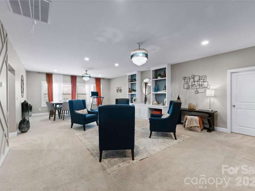 16703 Monocacy Boulevard, Huntersville, NC 28078.  MLS# CAR4356968, YatesRealty ID 7996. Huge Bonus Room for multiple activity areas.