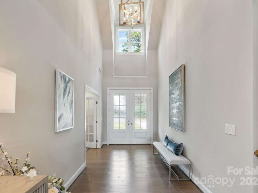 20601 Island Forest Drive, Cornelius, NC 28031.  MLS# CAR4232070, YatesRealty ID 7997. Bright and open foyer.