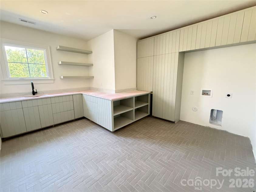 1430 Samuel Spencer Parkway, Davidson, NC 28036.  MLS# CAR4305336, YatesRealty ID 8. Massive upstairs Laundry