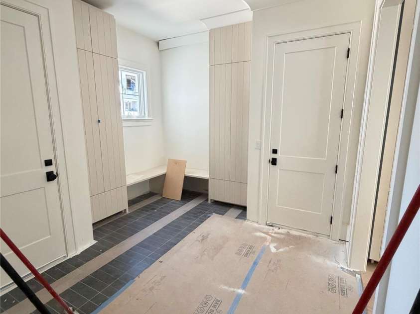 1430 Samuel Spencer Parkway, Davidson, NC 28036.  MLS# CAR4305336, YatesRealty ID 8. Mudroom off both gargags.