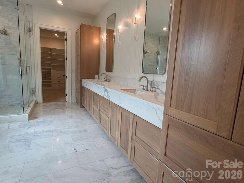 1430 Samuel Spencer Parkway, Davidson, NC 28036.  MLS# CAR4305336, YatesRealty ID 8. Primary Bathroom with 17 feet of cabinetry.  