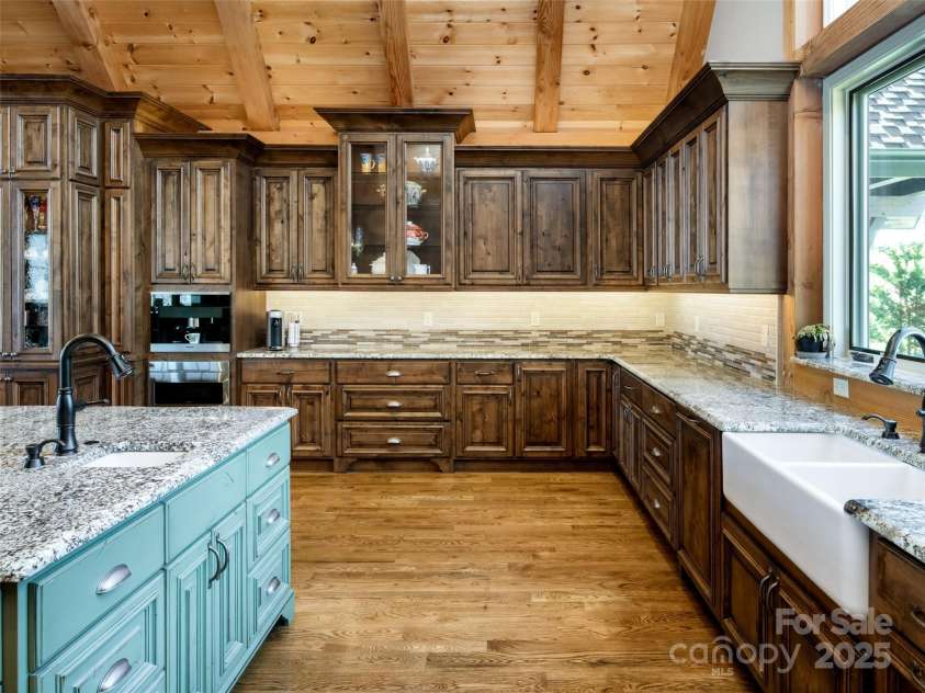 306 Dancing Bear Drive, Hendersonville, NC 28792.  MLS# CAR4234568, YatesRealty ID 8003. Extensive Counter and Cabinet Space to Ensure Ideal Kitchen Functionality