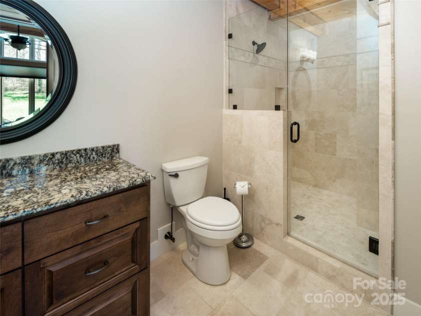 306 Dancing Bear Drive, Hendersonville, NC 28792.  MLS# CAR4234568, YatesRealty ID 8003. Second Full Bath on Lower Level