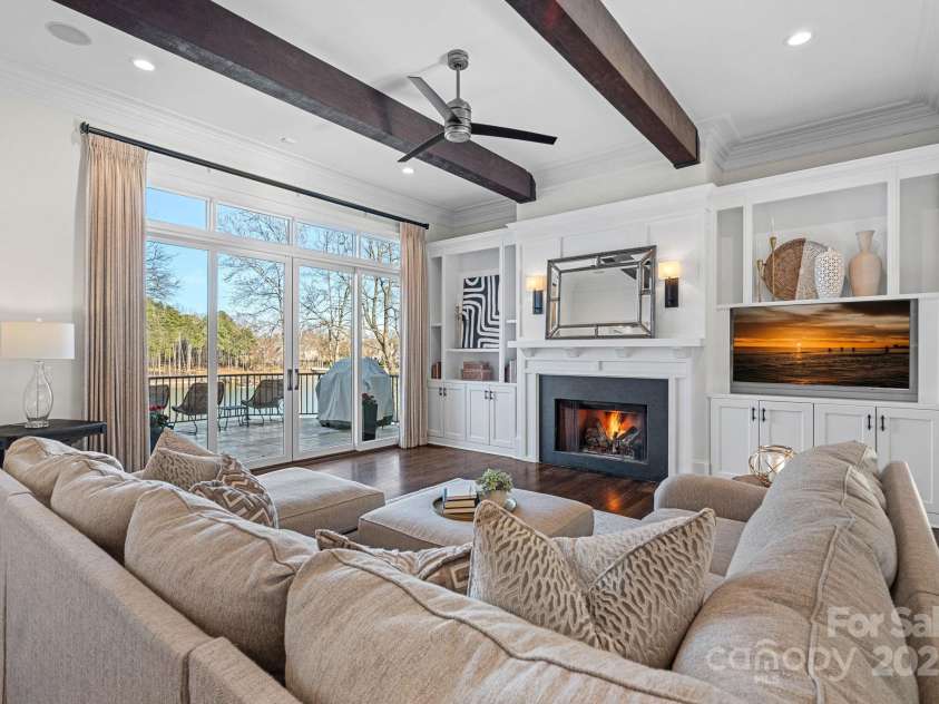 122 Longfellow Lane, Mooresville, NC 28117.  MLS# CAR4222583, YatesRealty ID 8004. Great room with solid wood beams