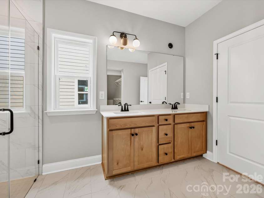 3422 Charolais Lane, Harrisburg, NC 28075.  MLS# CAR4359467, YatesRealty ID 8006. Owner's Bath