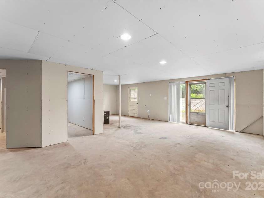 2333 Harmony Grove Road, Nebo, NC 28761.  MLS# CAR4248576, YatesRealty ID 8007. Large unfinished basement