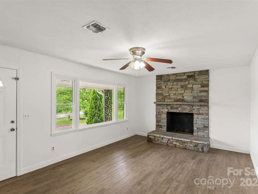 2333 Harmony Grove Road, Nebo, NC 28761.  MLS# CAR4248576, YatesRealty ID 8007. Spacious living room