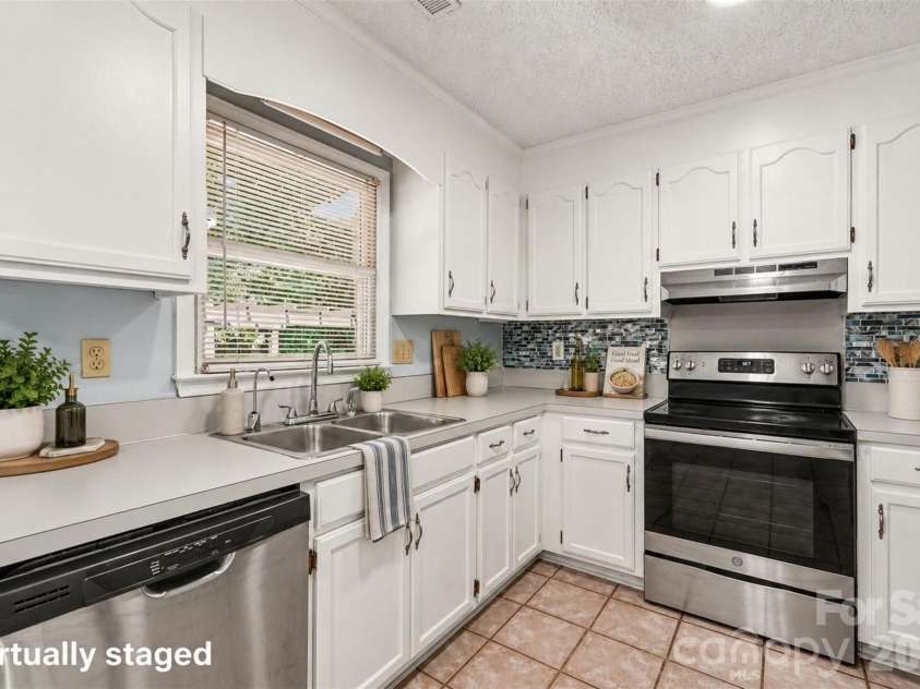 7225 Mcteal Place, Charlotte, NC 28262.  MLS# CAR4421382, YatesRealty ID 8008. 